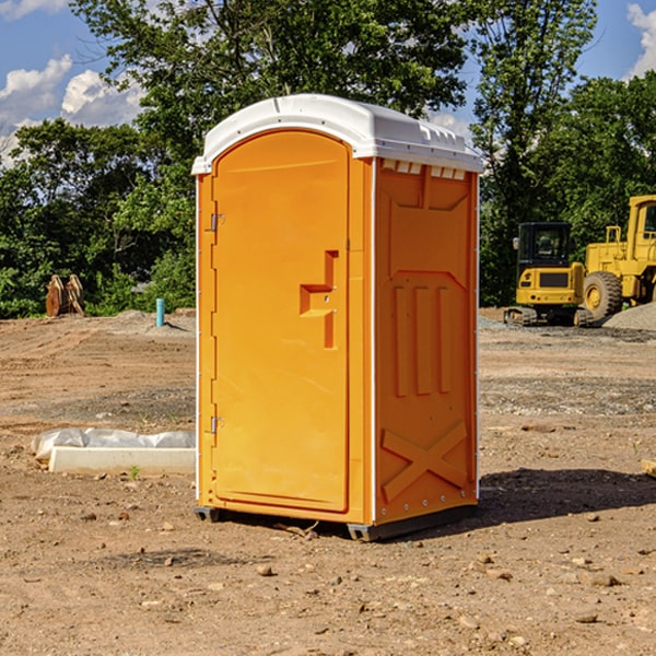 how often are the portable restrooms cleaned and serviced during a rental period in Genoa